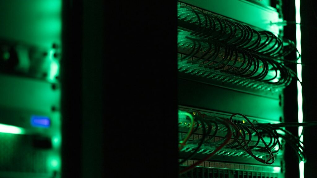 Blue lit server racks representing Bluehost Starter and Business web hosting tiers
